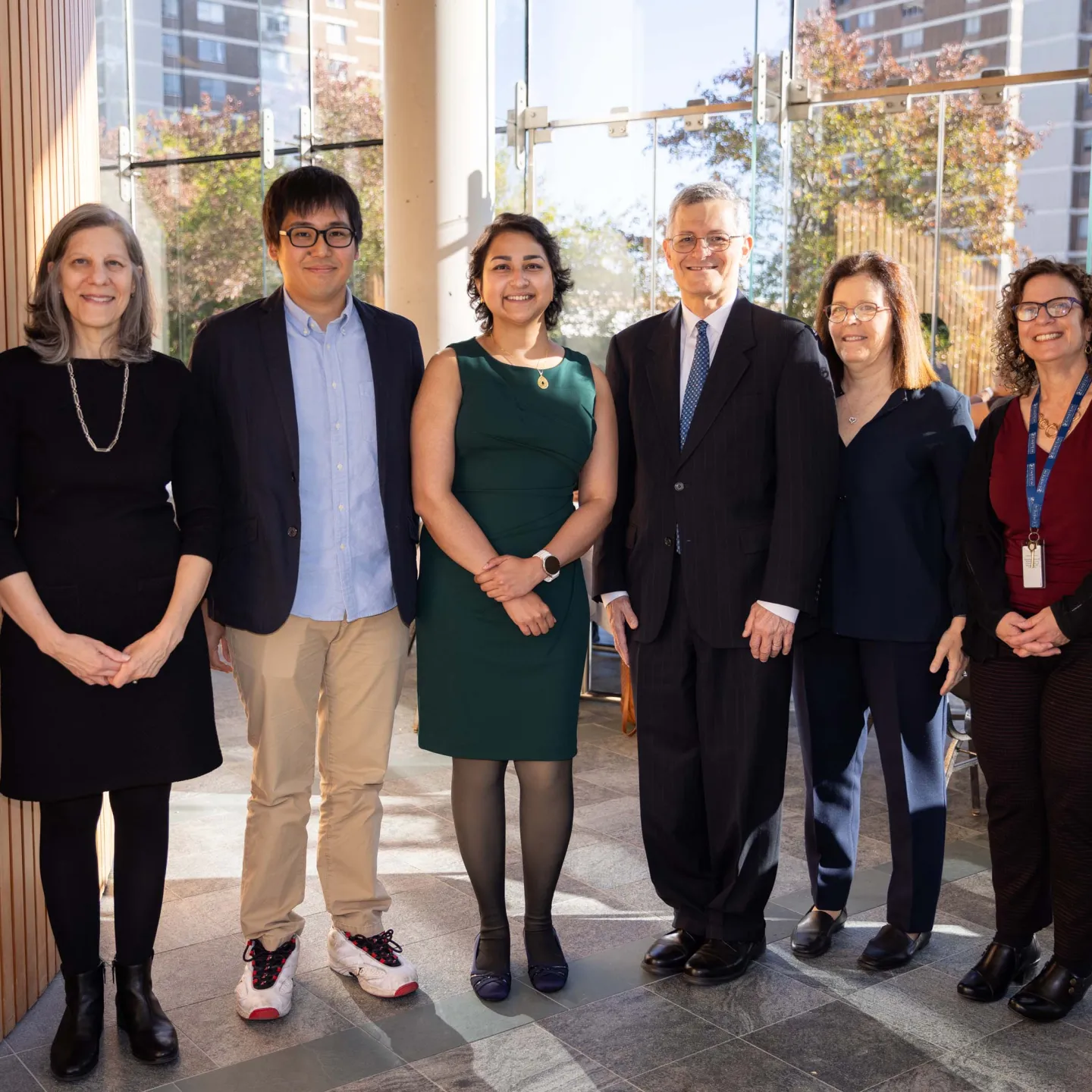 Dean Yaron Tomor, Junichi Okada, Rabia Khawaja, Anne Bresnick and Diane Safer pose for photo in atrium