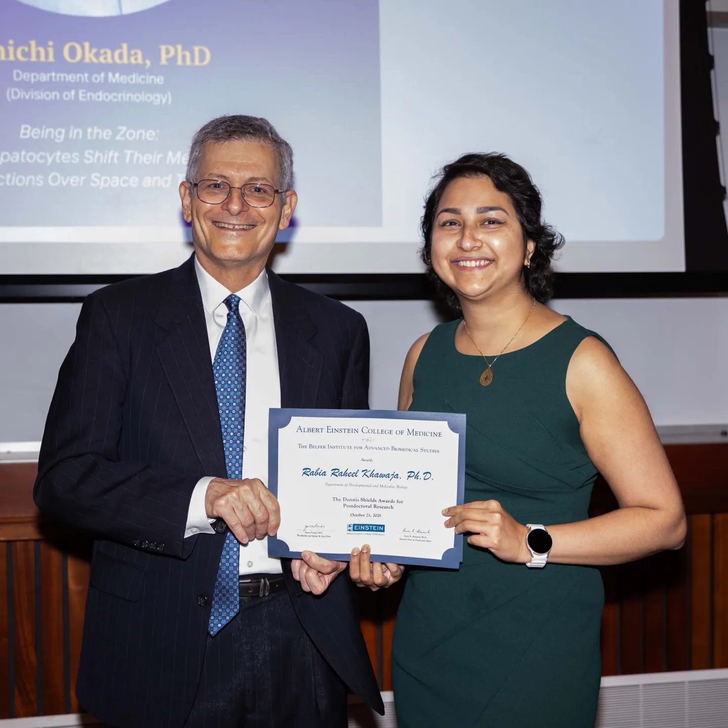 Dean Yaron Tomer and Rabia Khawaja photo with certificate in Lefrak Auditorium
