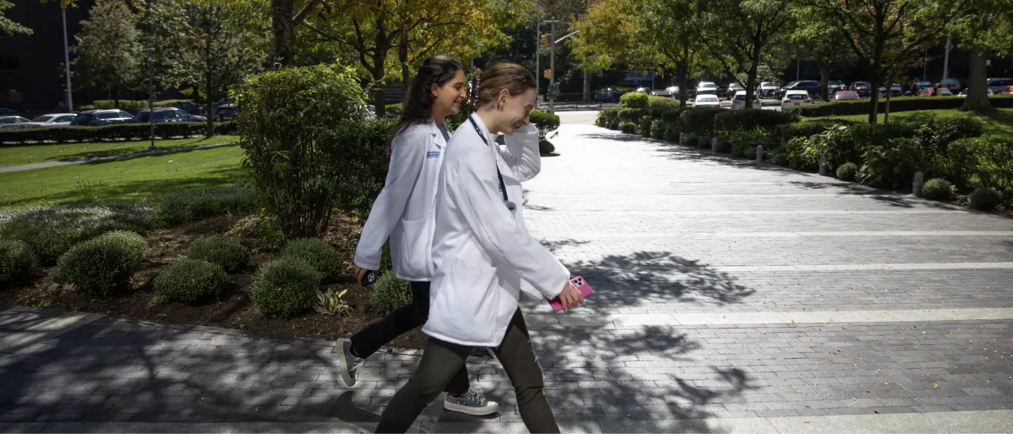 students walking through campus