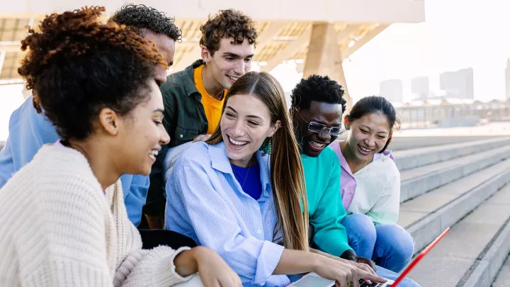 Diverse Students Sitting Outside