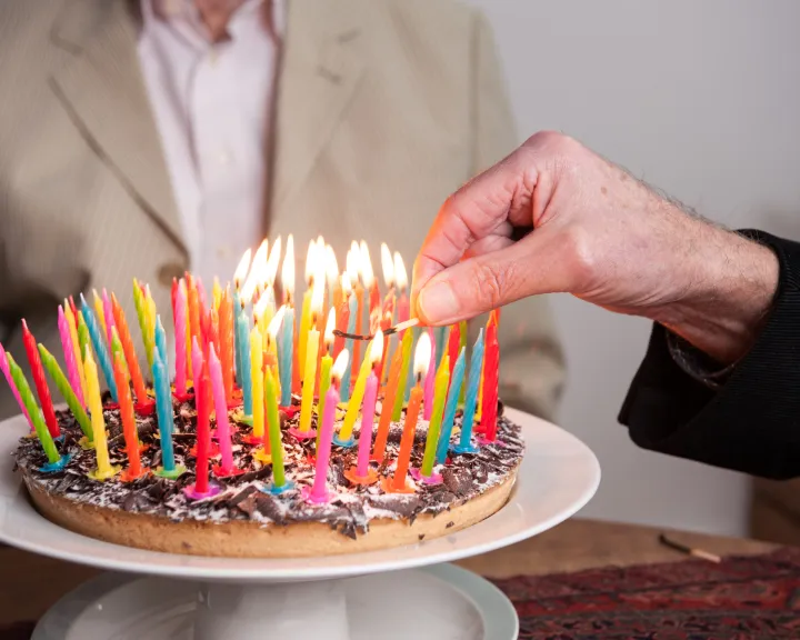 Lighting 93 candles on a cake
