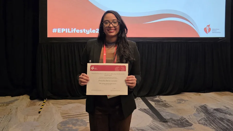Priscilla Duran-Luciano with Certificate