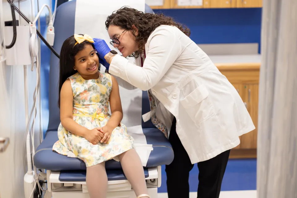 Doctor Examining Child's Ear